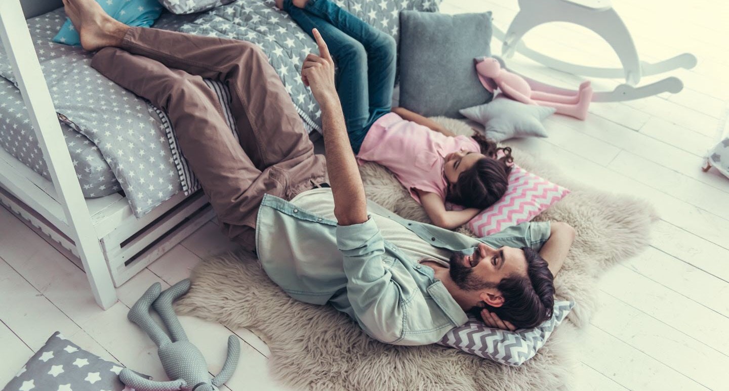 Father and daughter playing