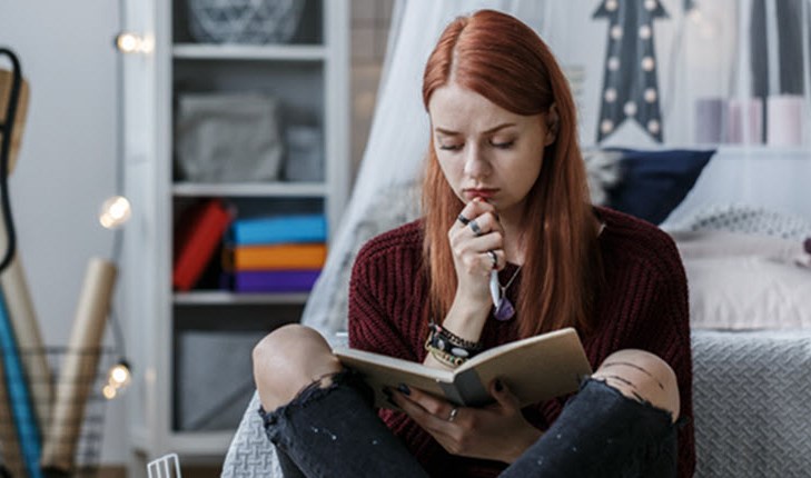 Girl reading diary
