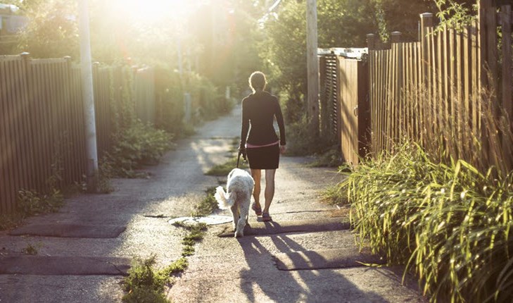 Woman walking with dog