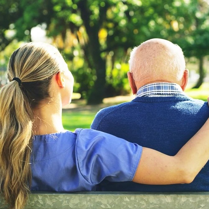 Caregiver with a patient in the nature